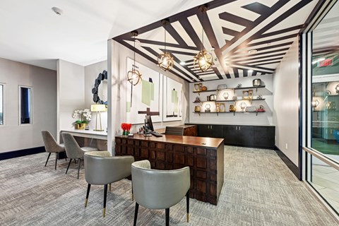 Leasing office featuring a cozy lounge area for residents at Harlow River Oaks apartments in Houston, TX